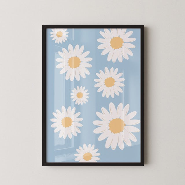 Breng een frisse en zomerse sfeer in huis met deze poster vol witte madeliefjes op een zachte blauwe achtergrond. Het speelse patroon straalt vrolijkheid en lichtheid uit en past perfect in een modern, Scandinavisch of boho interieur. Geprint op 250 grams premium satin papier voor een luxe afwerking en heldere details – ideaal voor liefhebbers van bloemenposters en frisse wanddecoratie.