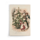 Familie rond de Kerstboom