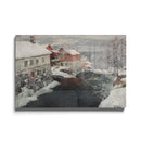 Rivière traversant un village enneigé