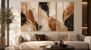 Golden Abstract Flow drieluik in een moderne woonkamer