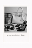 Zwart-wit poster met luxe items zoals tas, parfum en hakken met quote “Indulge in life’s finer things”