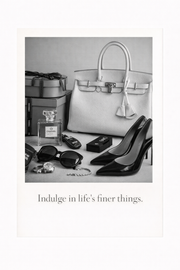 Zwart-wit poster met luxe items zoals tas, parfum en hakken met quote “Indulge in life’s finer things”