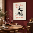 There’s Always Time for a Glass of Wine in een sfeervolle eetkamer met bordeauxrode muur, ronde houten eettafel en een karaf