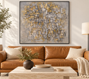 Piet Mondriaan - Tableau No. 2,Composition No. VII (1913) in een zwarte lijst boven een cognackleurige bank in een lichte woonkamer