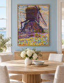 Piet Mondriaan - The Winkel Mill (1908) in een eiken lijst in een lichte eetkamer met een zachtblauwe muur
