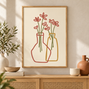 Vase Duet twee bloemenvazen lijntekening poster in houten lijst boven een eiken kast in een warm interieur