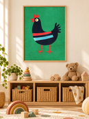 Gestreepte Kip Groen in een houten lijst boven een speelgoedkast in een lichte kinderkamer