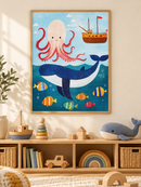 Walvis Octopus en Zeeschip in een houten lijst boven een speelgoedkast in een lichte kinderkamer